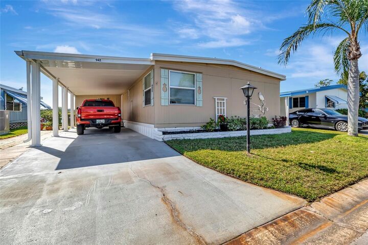Property Photo:  1401 W Highway 50 142  FL 34711 
