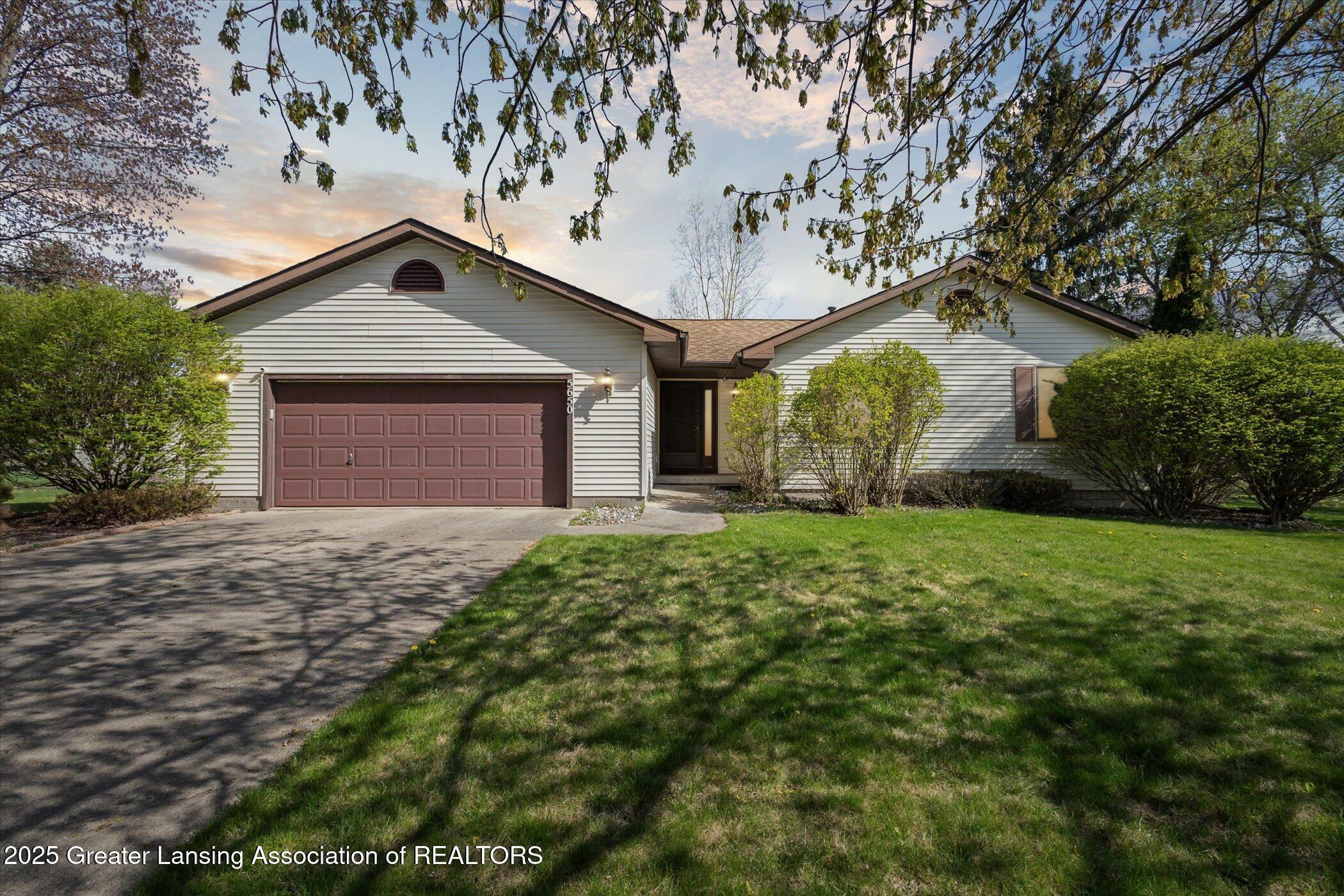 Property Photo: 5650 Lochwoode Court MI 48842