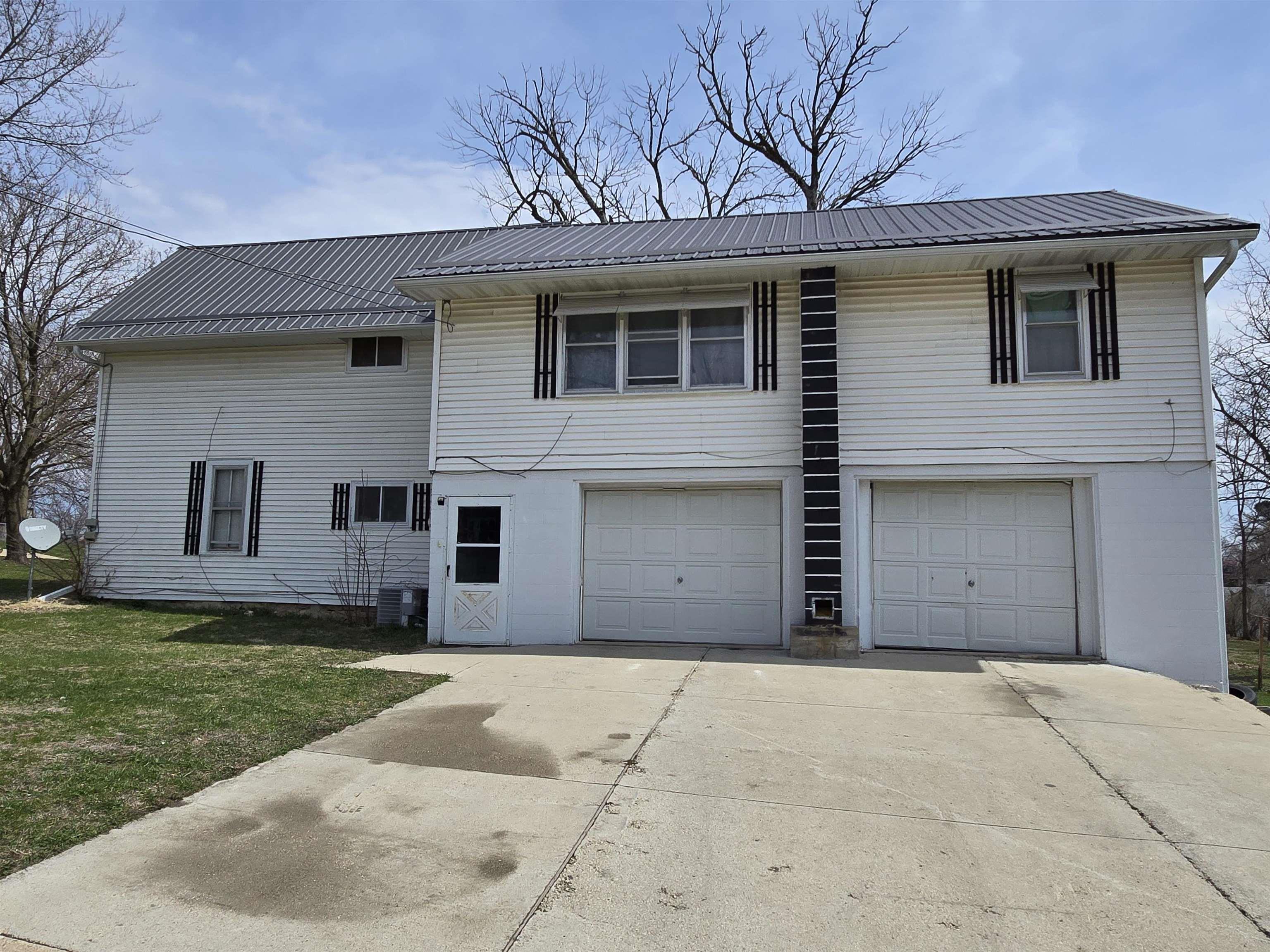 Property Photo: 220 W Spring Street IA 52076