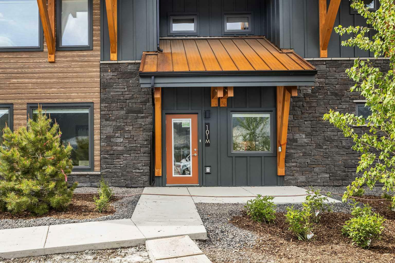 Property Photo: 209 Stewart Creek Rise 101L AB T1W 0N9