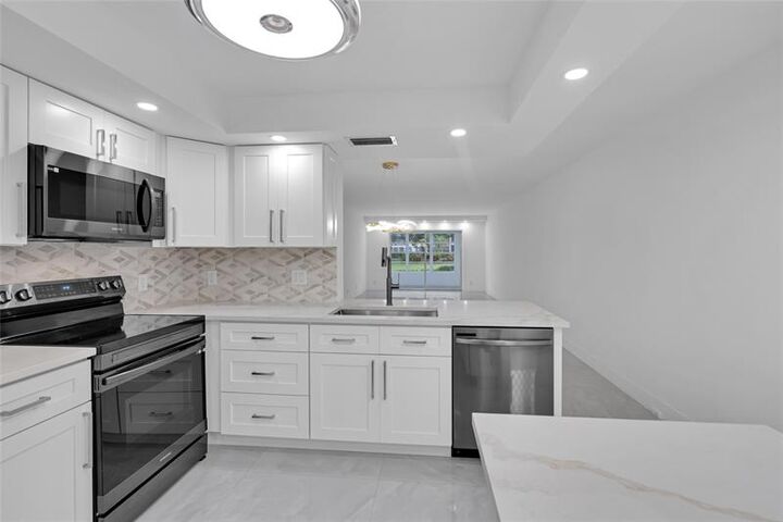 Property Photo:  2001 Granada Dr L1  FL 33066 