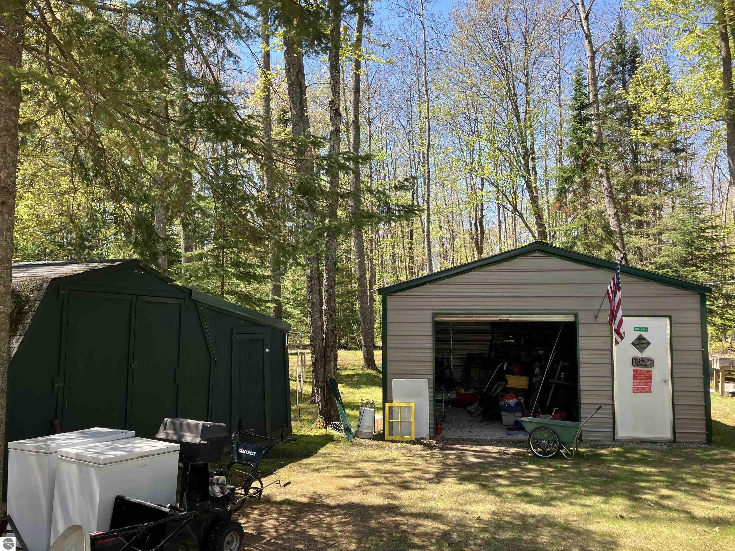 Property Photo:  1295 NE Wa-Ba-Tesse Drive  MI 49646 