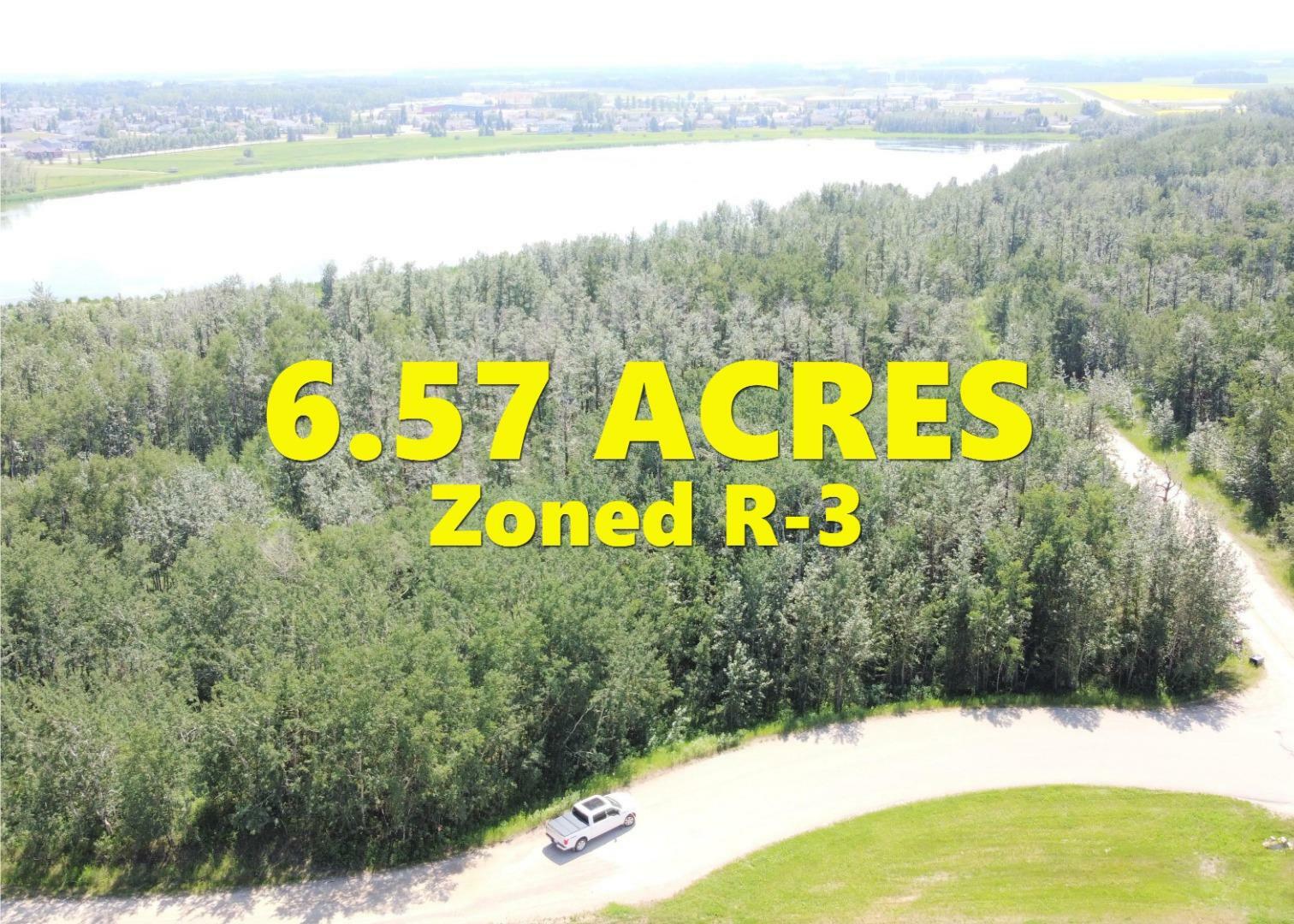 Property Photo: 5645 Lakeside Way AB T4G 0H4