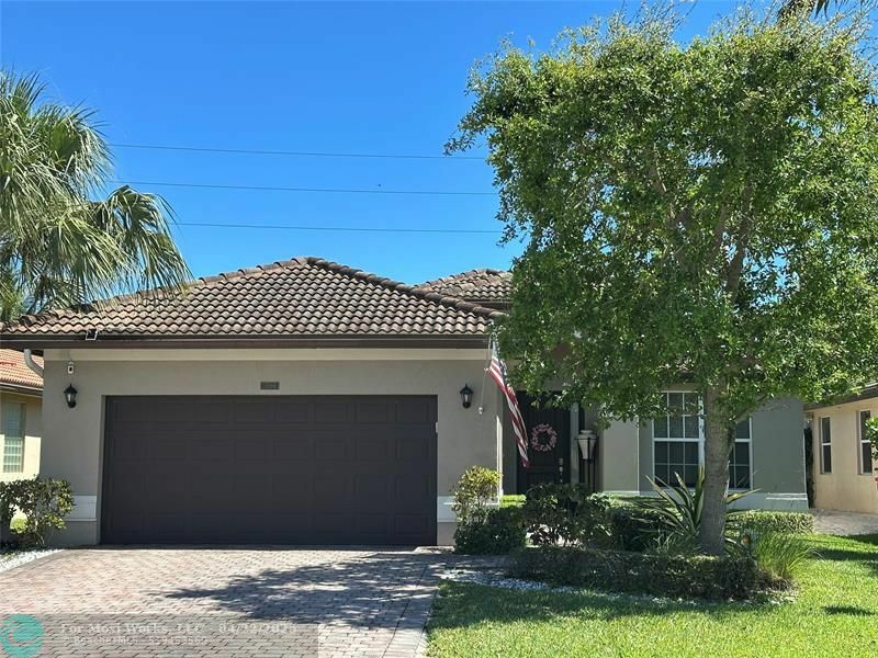 Property Photo:  7194 Prudencia Dr  FL 33463 