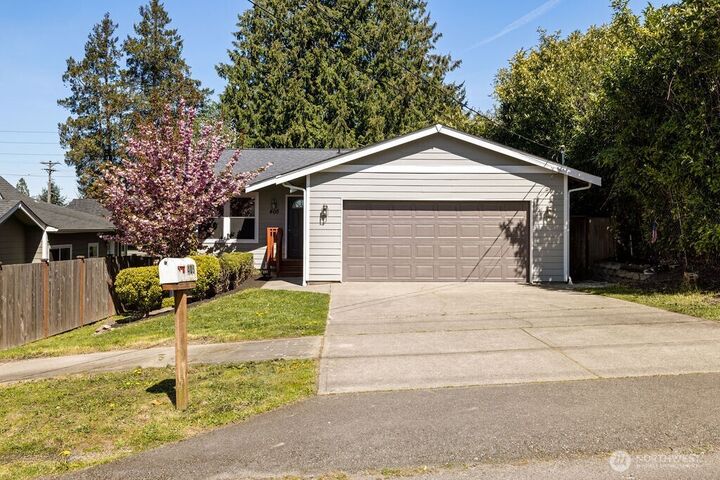 Property Photo:  405 E 65th Street  WA 98404 