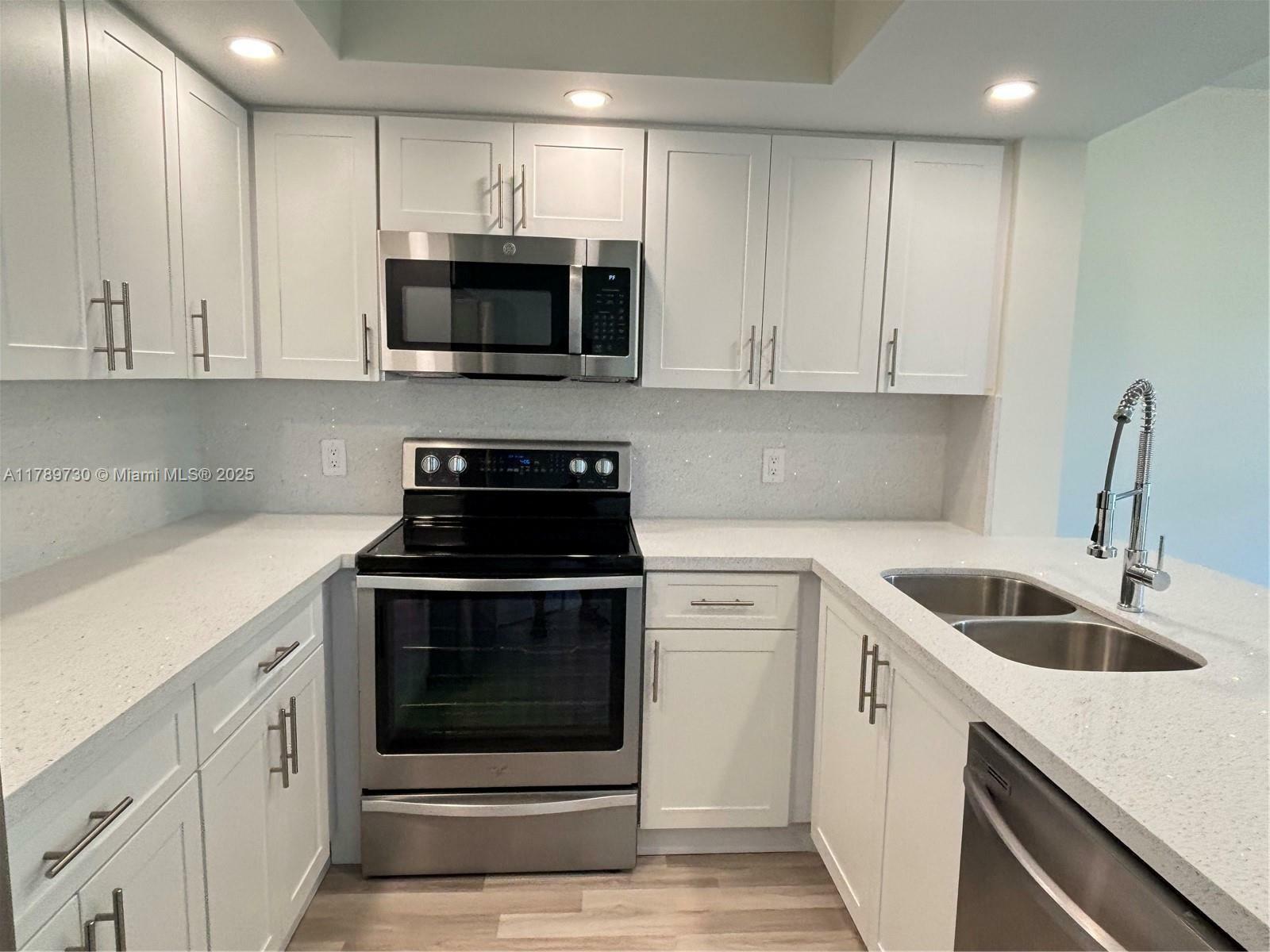 Property Photo: 100 SW 130th Ter 303C FL 33027