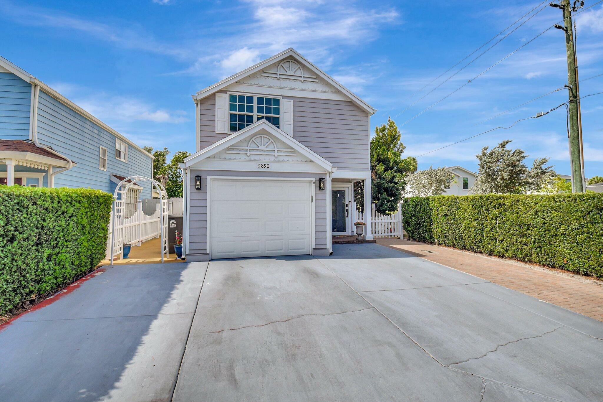 Property Photo: 5890 Rambler Rose Way FL 33415