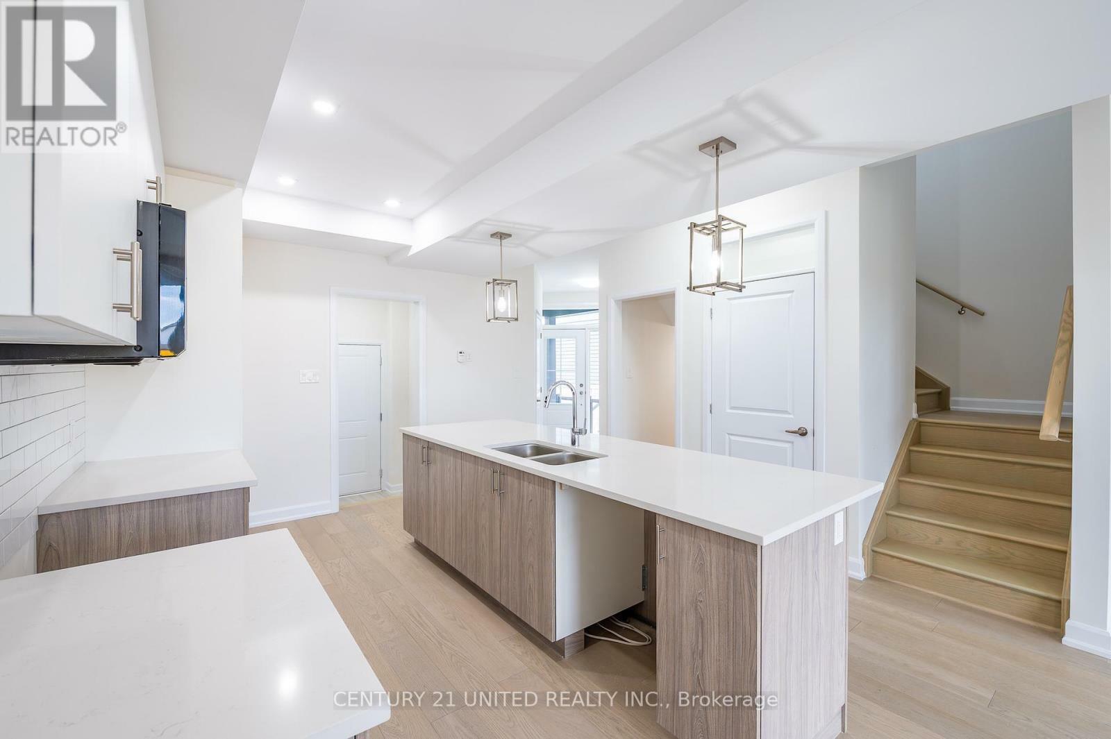 Property Photo: 319 Mullighan Gardens ON K9K 0H2