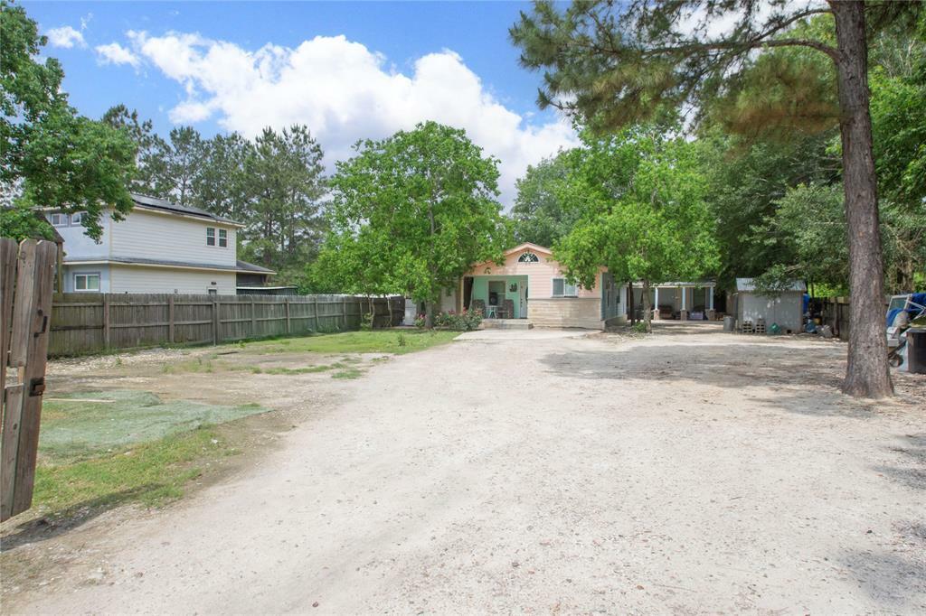 Property Photo: 109 County Road 3413 TX 77327