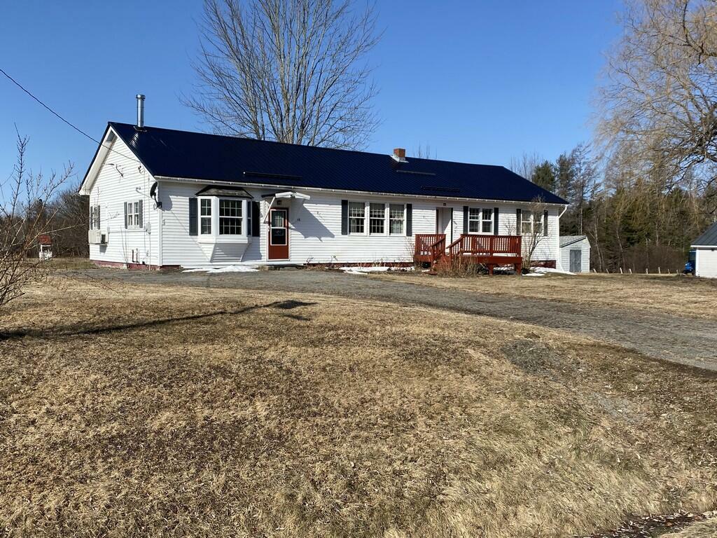 Property Photo: 48 Medway Road ME 04459