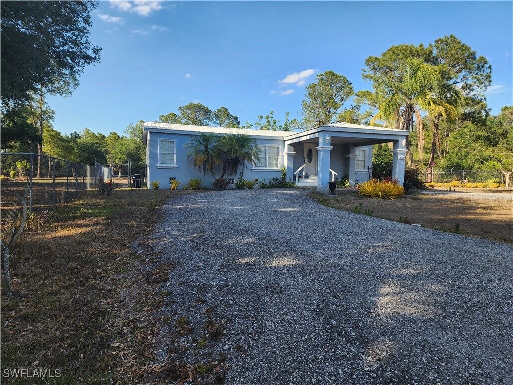 Property Photo: 369 Bald Cypress Avenue FL 33440