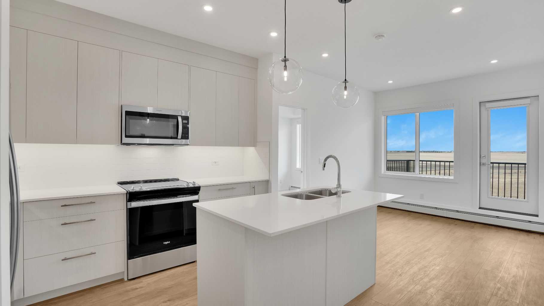 Property Photo: 6 Merganser Drive W 4415 AB T1X 2Y2