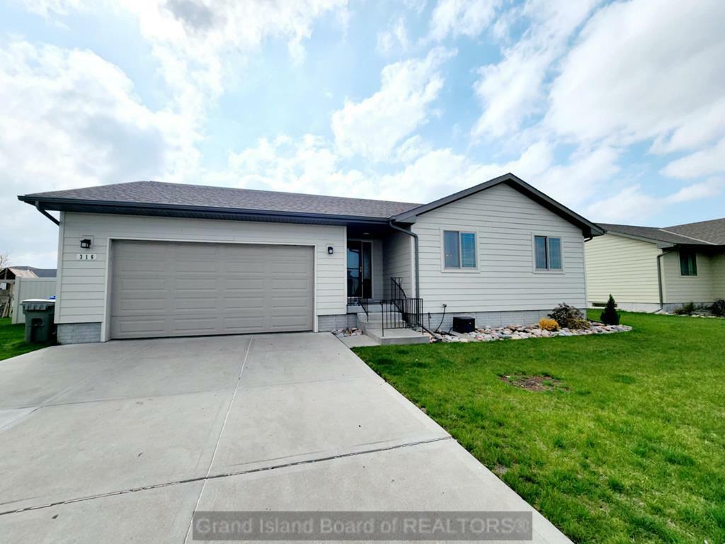 Property Photo: 316 Brome Grass Dr NE 68803
