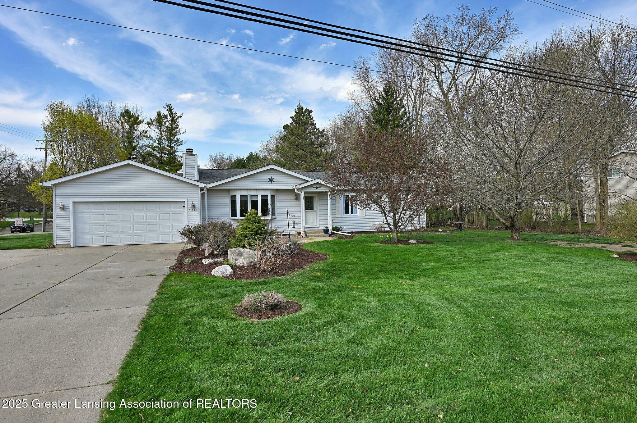 Property Photo: 1318 W Herbison Drive MI 48820