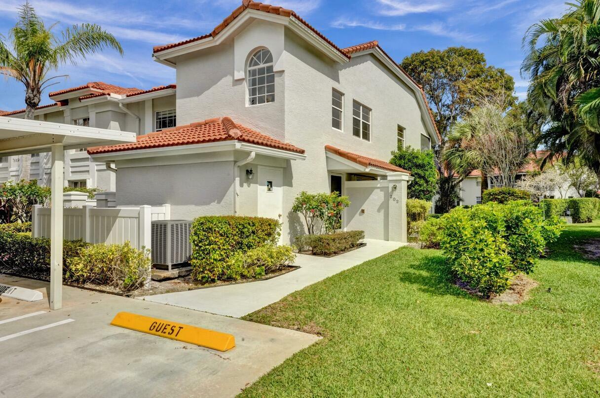 Property Photo: 7669 Springwater Place 202 FL 33437