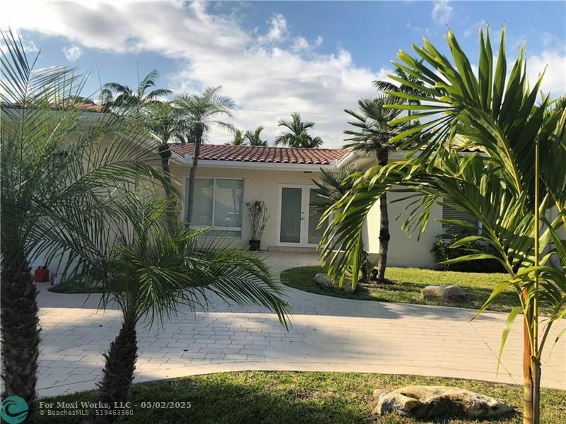 Property Photo: 5911 NE 22nd Way FL 33308