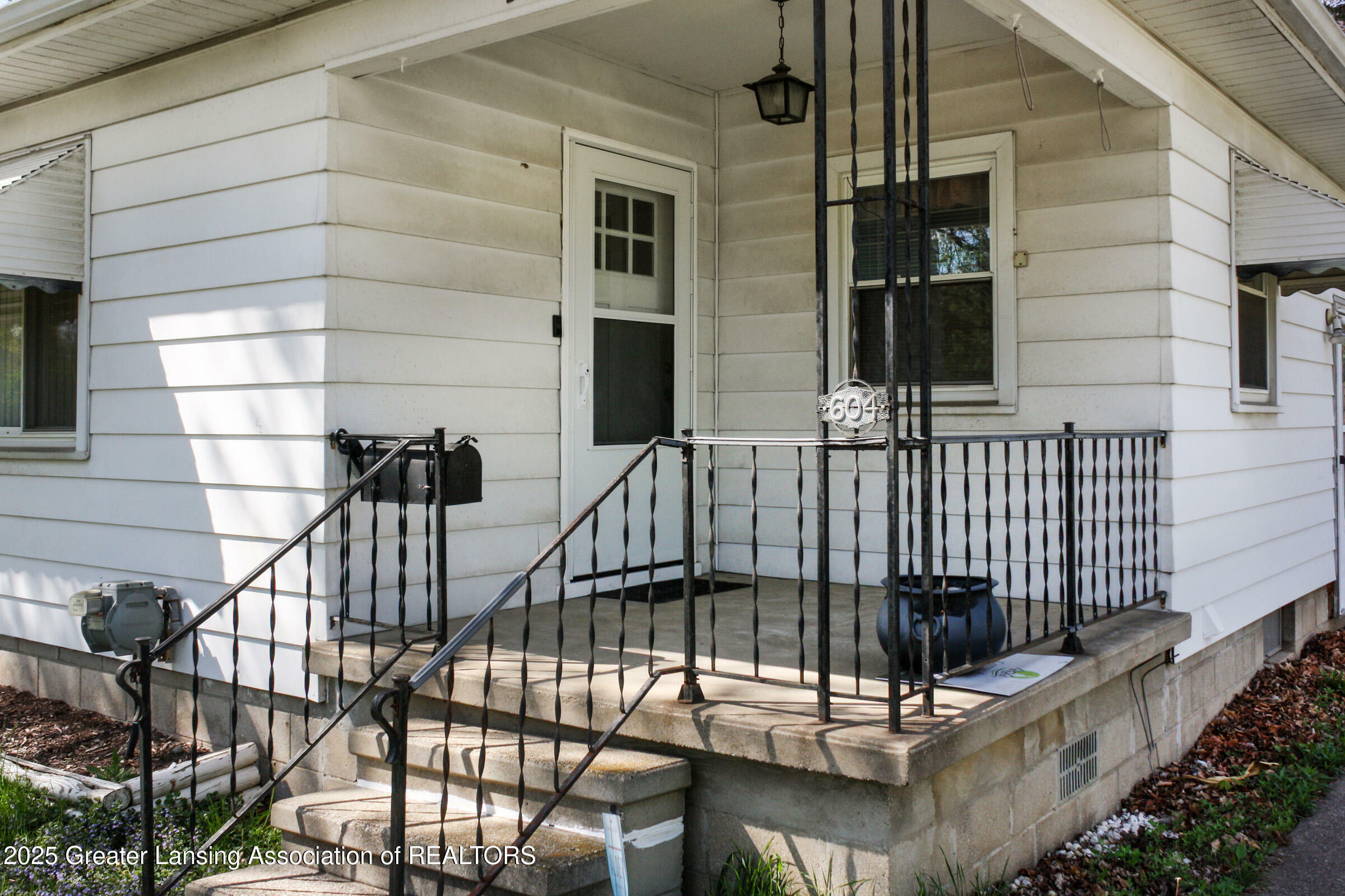 Property Photo: 604 W Holmes Road MI 48910