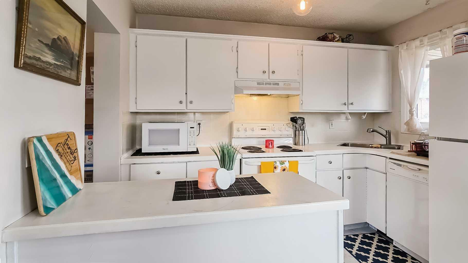 Property Photo: 4504 47 Street 201 AB T4G 1P5