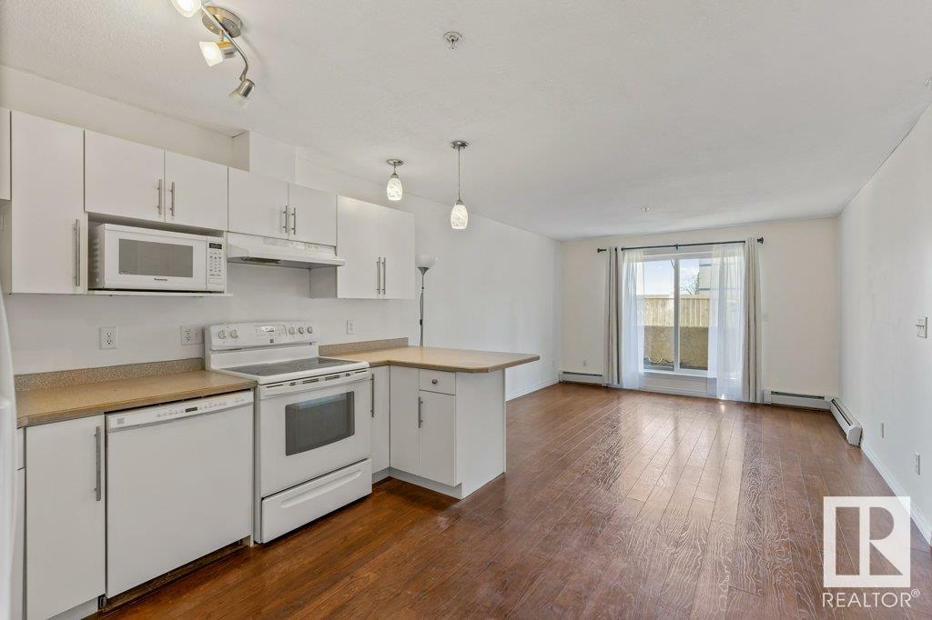 Property Photo:  7511 171 Street NW 121  AB T5T 6S7 
