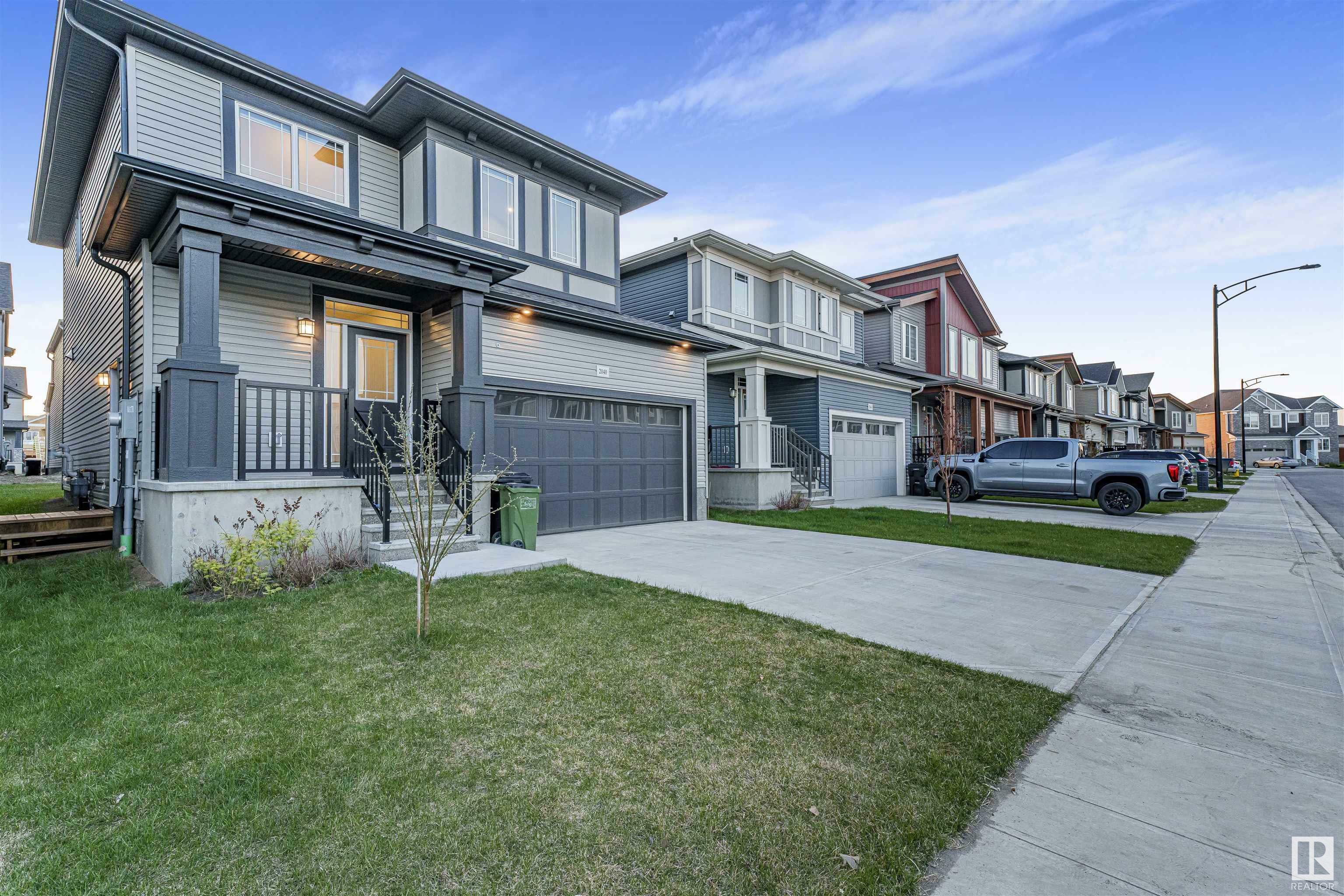 Property Photo: 2040 207 Street NW AB T6M 1R7
