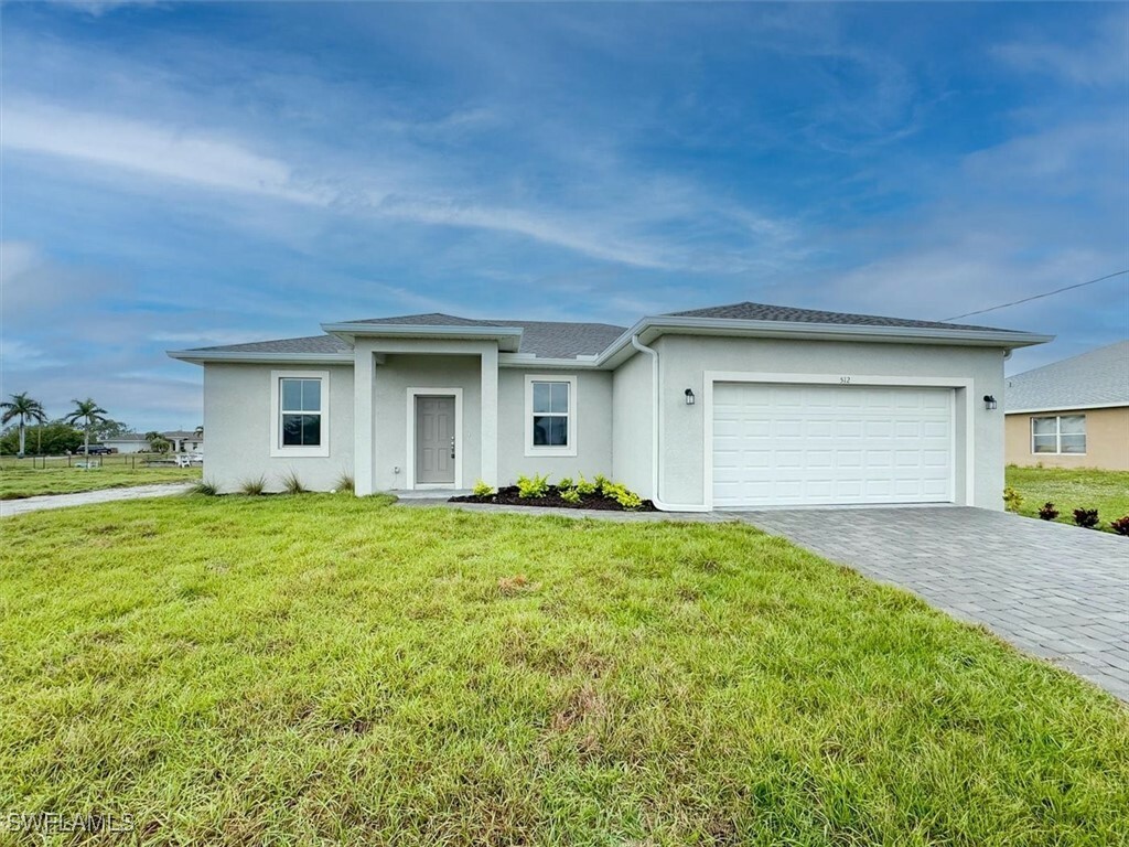 Property Photo: 512 NW 25th Avenue FL 33993