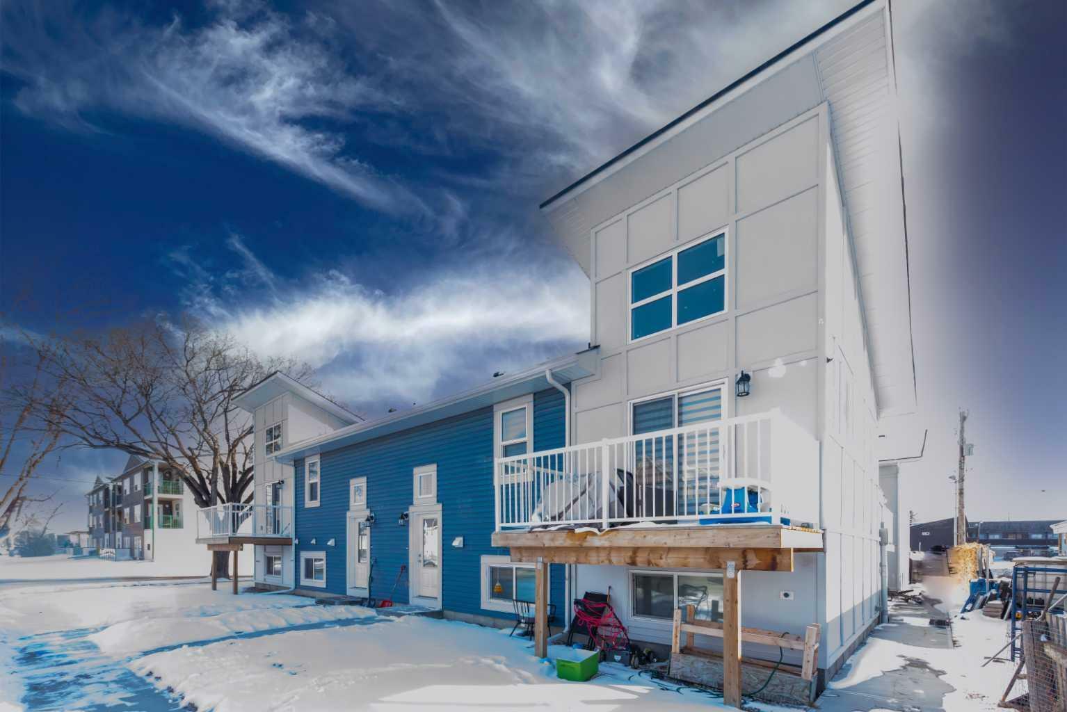 Property Photo: 41 7 Avenue SE 6 AB T1V 1E9