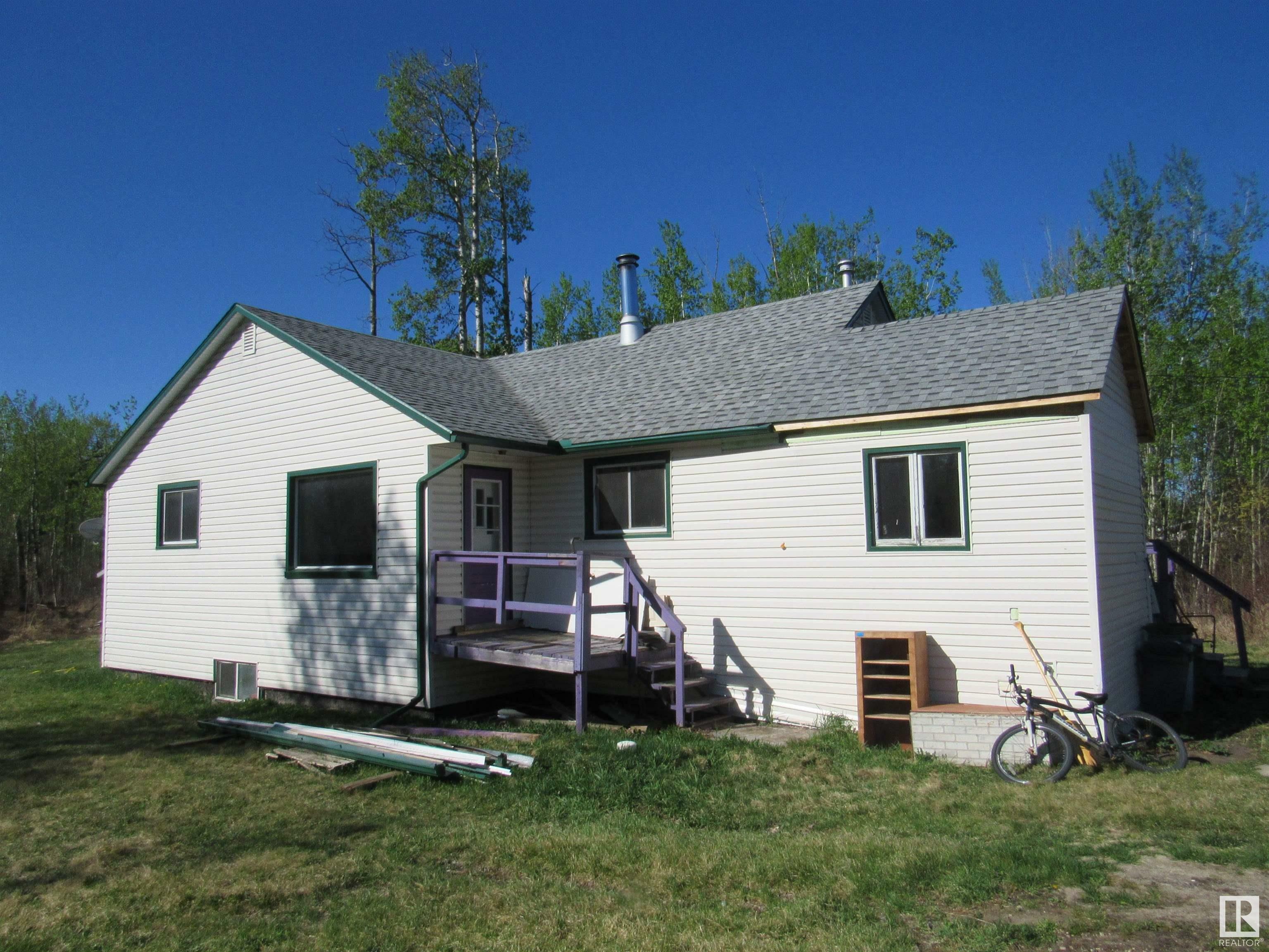Property Photo:  101 - 57312 Rge Rd 25  AB T0E 1A0 