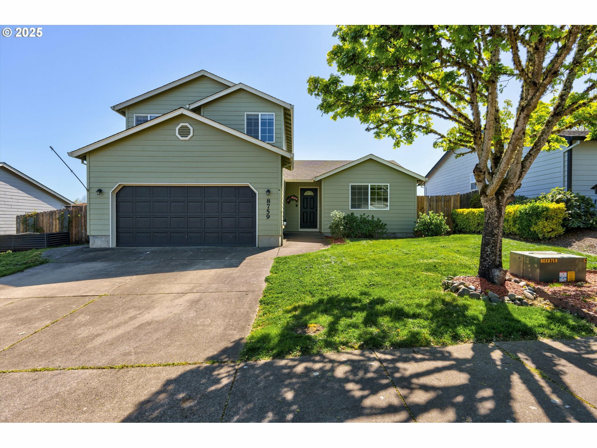 Property Photo: 8759 NE Box Elder St OR 97330