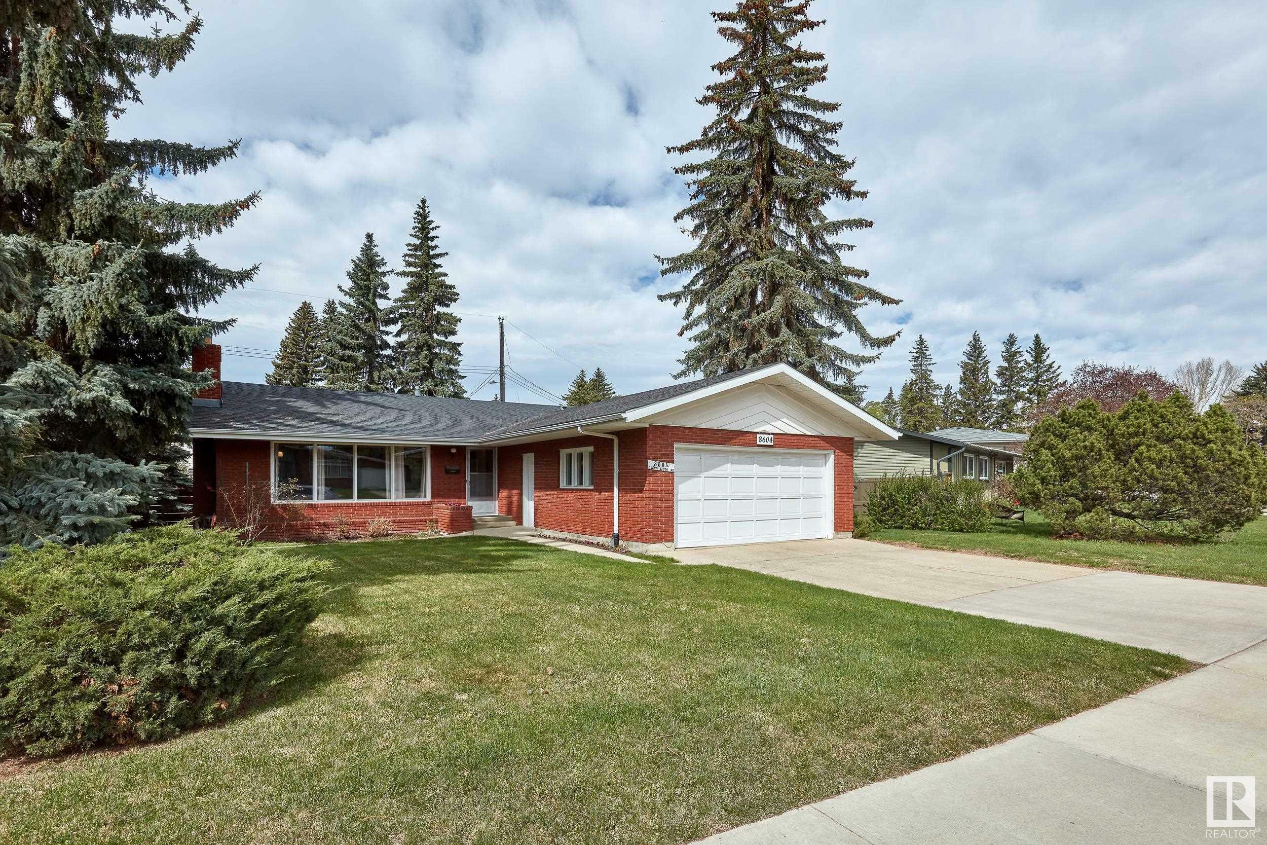 Property Photo: 8604 Buena Vista Road NW AB T5R 5R8