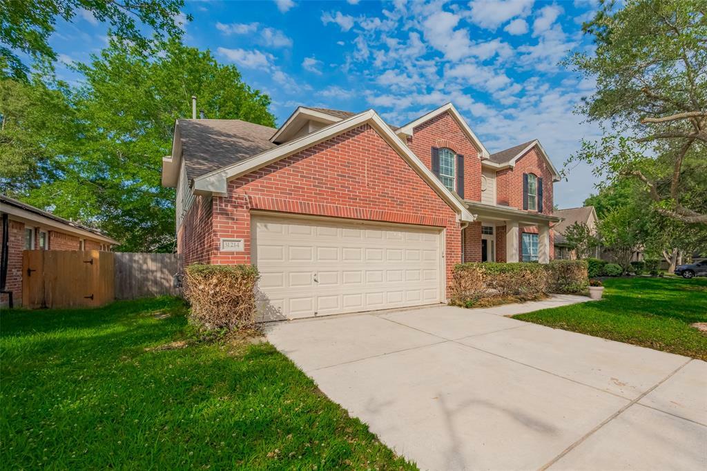 Property Photo: 31214 Windcrest Park Lane TX 77386