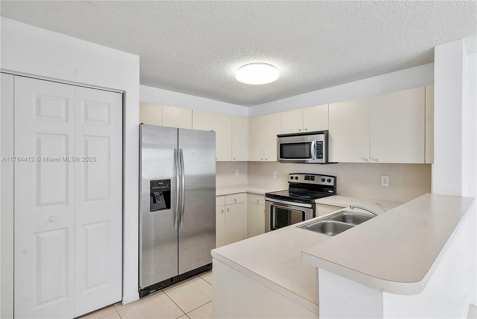 Property Photo: 12488 SW 54th St FL 33027