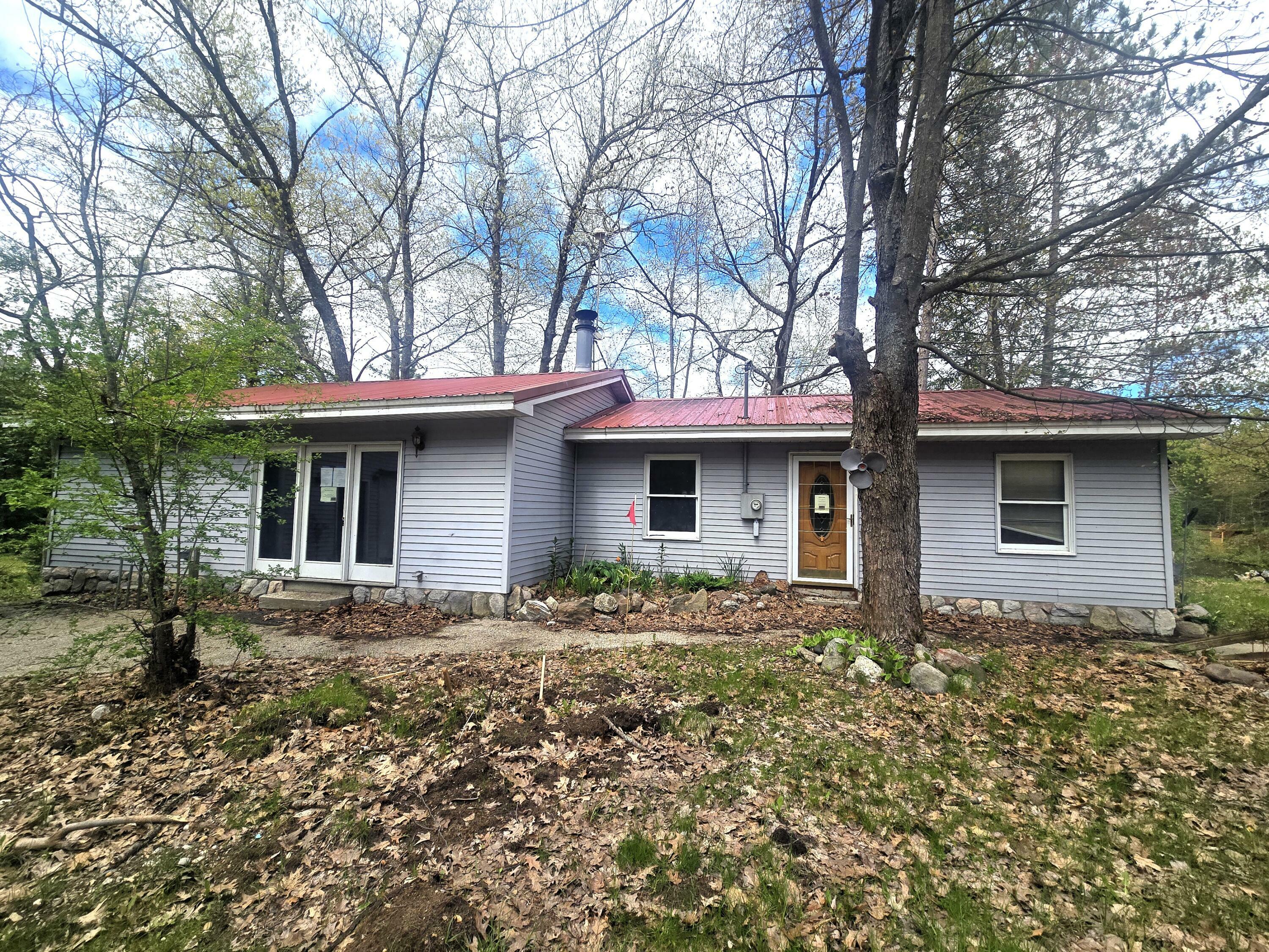 Property Photo: 8750 White Pine Pass SE MI 49633