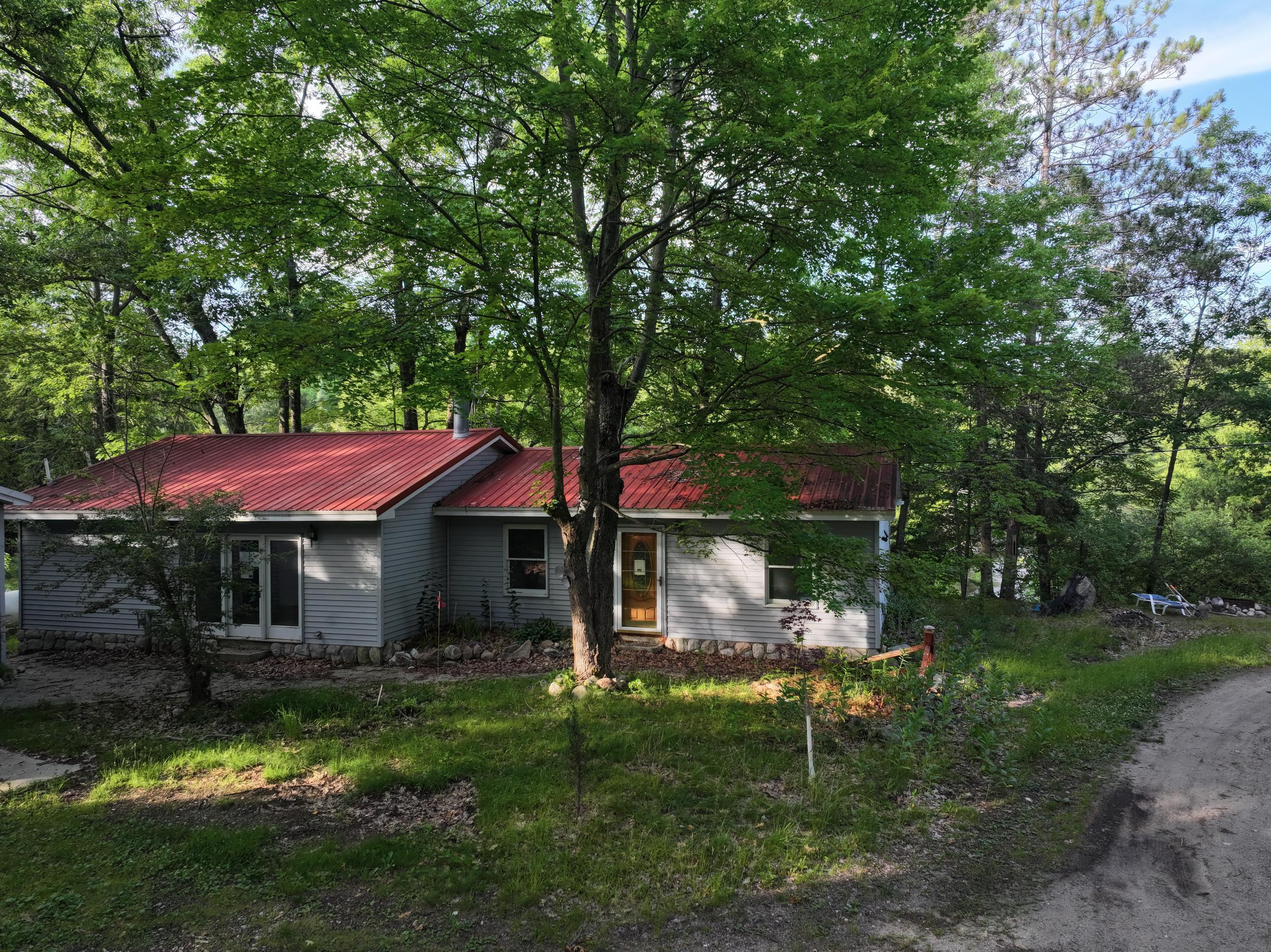 Property Photo: 8750 White Pine Pass SE MI 49633