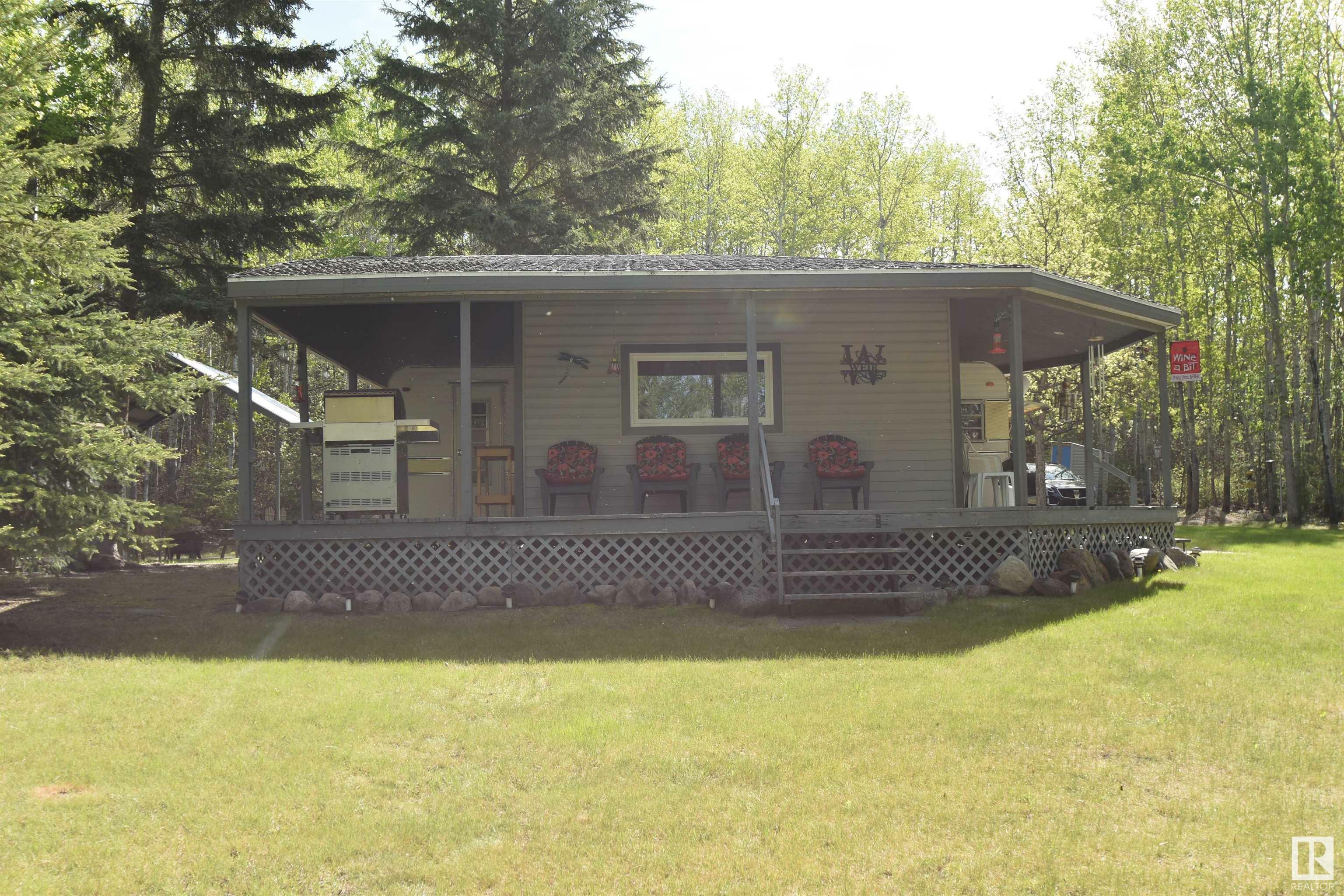 Property Photo: 228, 58532 Rng Rd 113 AB T0A 2Y0