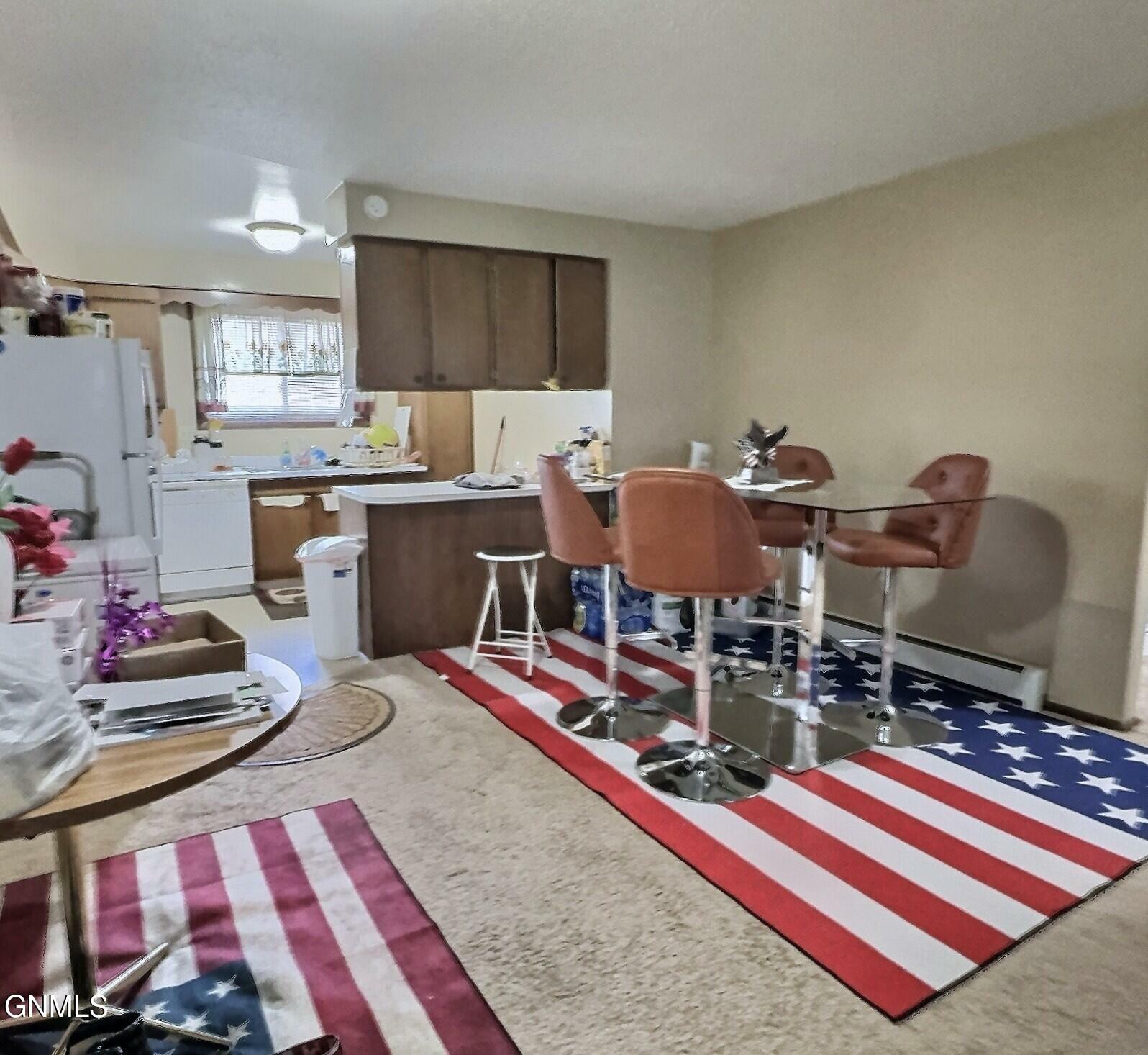 Property Photo: 918 Owens Avenue E 11 ND 58501