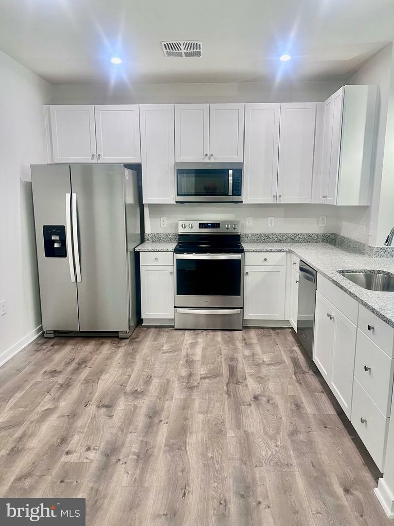 Property Photo: 750 Mount Airy Terrace NE 106 VA 20176