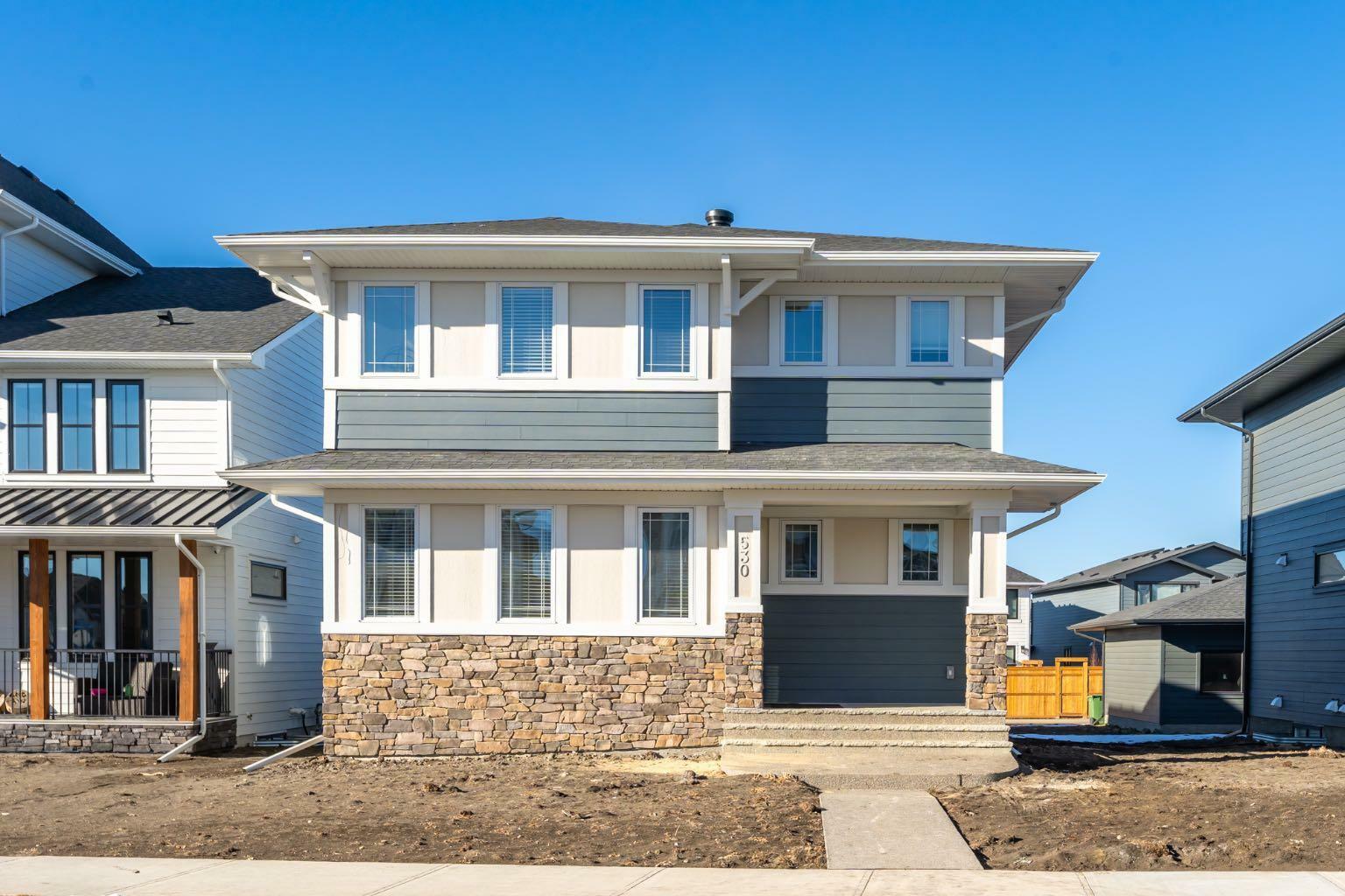 Property Photo: 530 South Harmony Drive AB T3Z 0G2