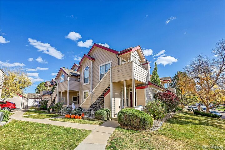 Property Photo: 8371 S Upham Way 208 CO 80128