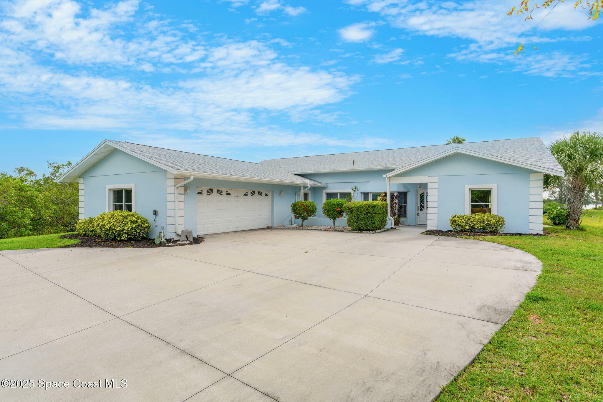 Property Photo: 9620 S Tropical Trail FL 32952