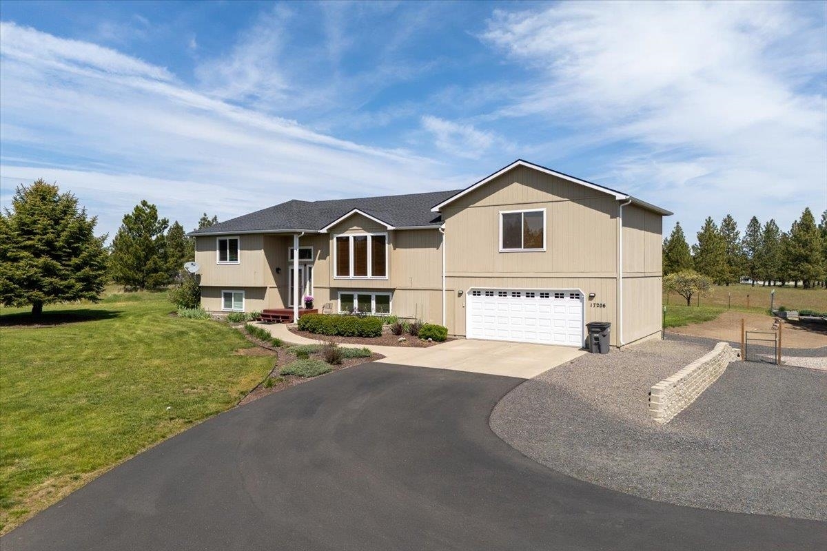 Property Photo:  17206 W Buckboard Ave  WA 99022 