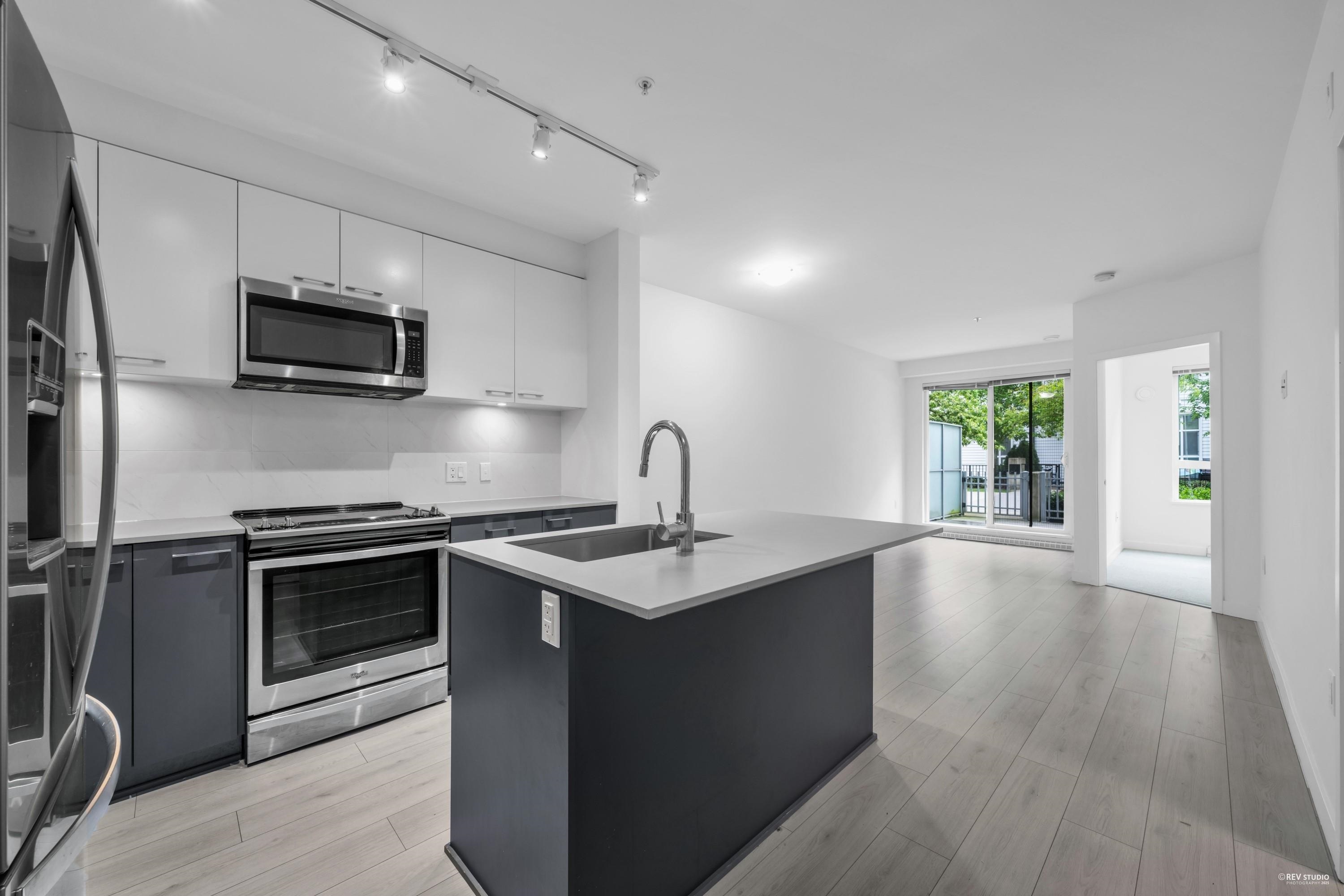 Property Photo: 13963 105 Boulevard 121 BC V3T 0M9