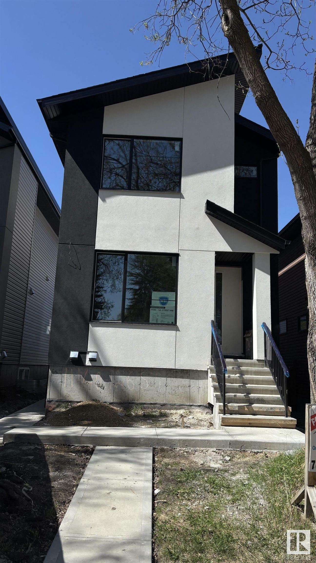 Property Photo:  11140 126 Street NW  AB T5M 0P9 