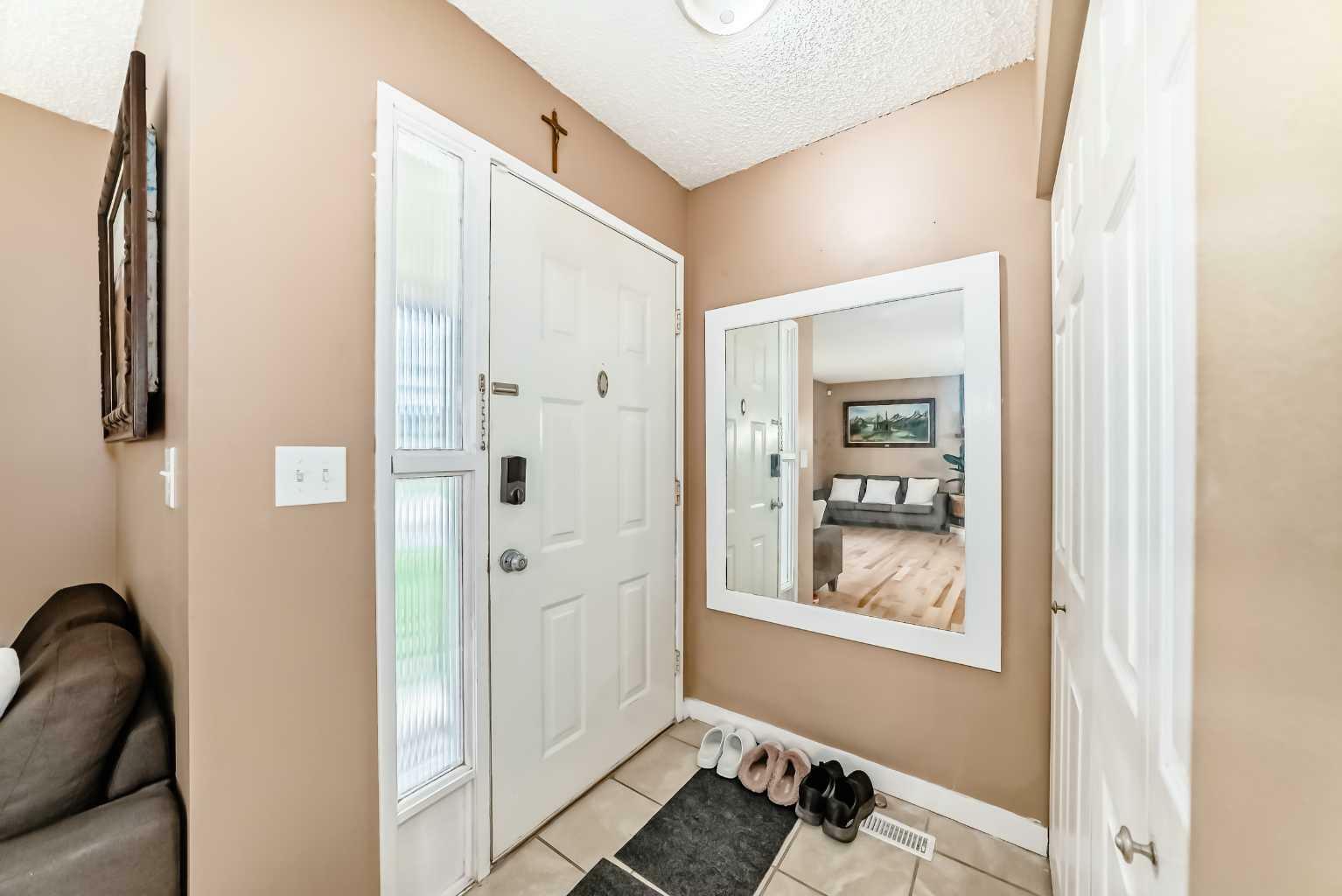 Property Photo: 215 Sunvale Crescent SE AB T2X 2P8