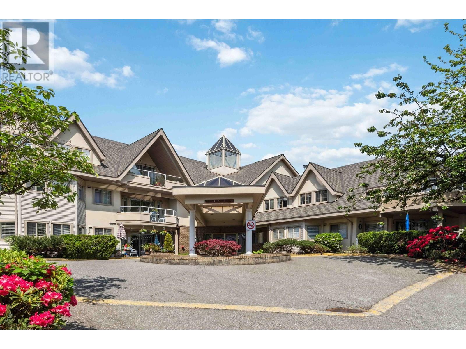 Property Photo: 19241 Ford Road 311 BC V3Y 2N4