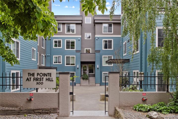 Property Photo:  300  10th Avenue A302  WA 98122 