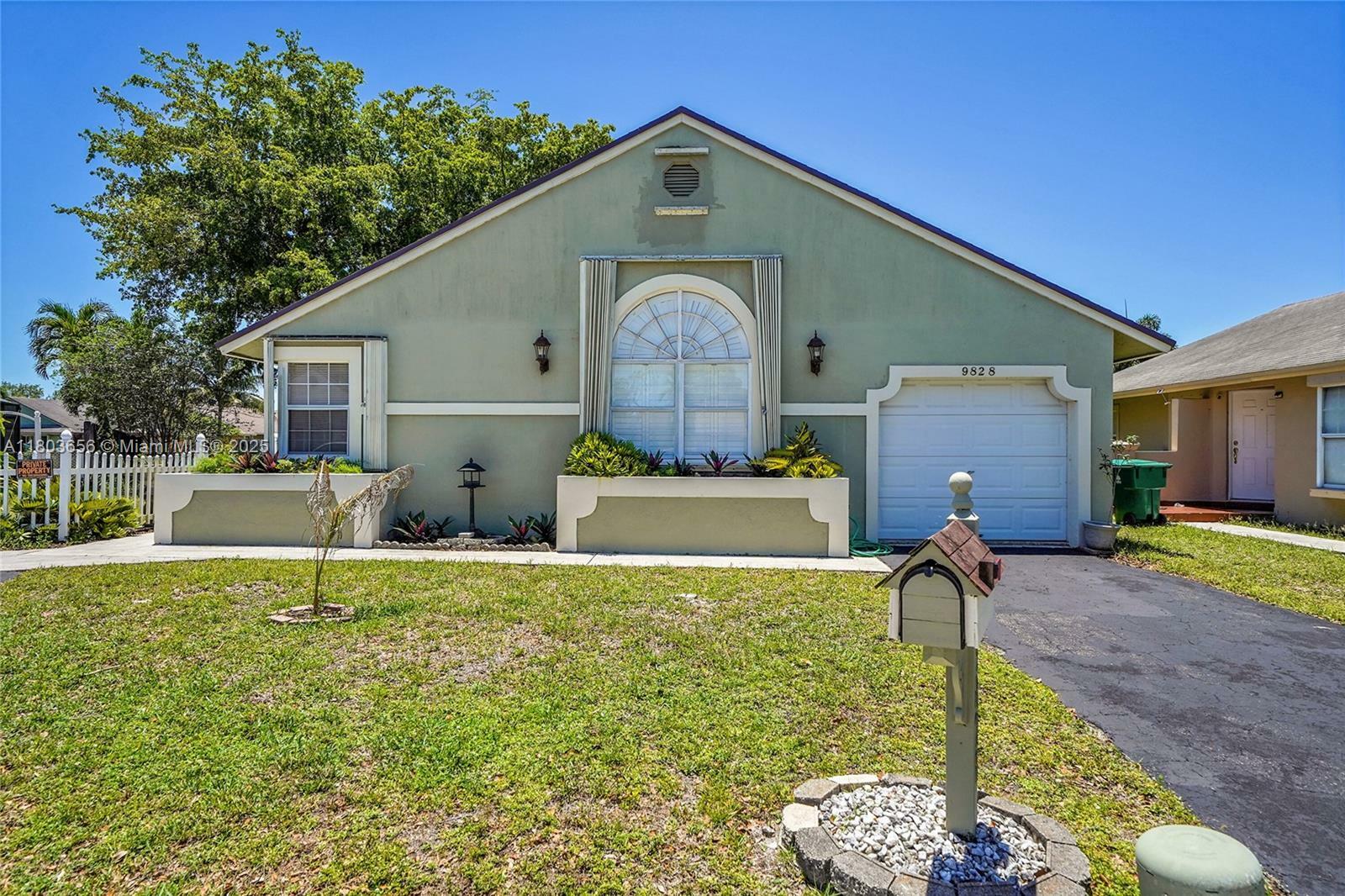 Property Photo: 9828 SW 58th Ct FL 33328