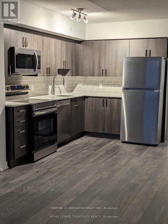 Property Photo: 1455 Celebration Drive 511 ON L1W 0C3