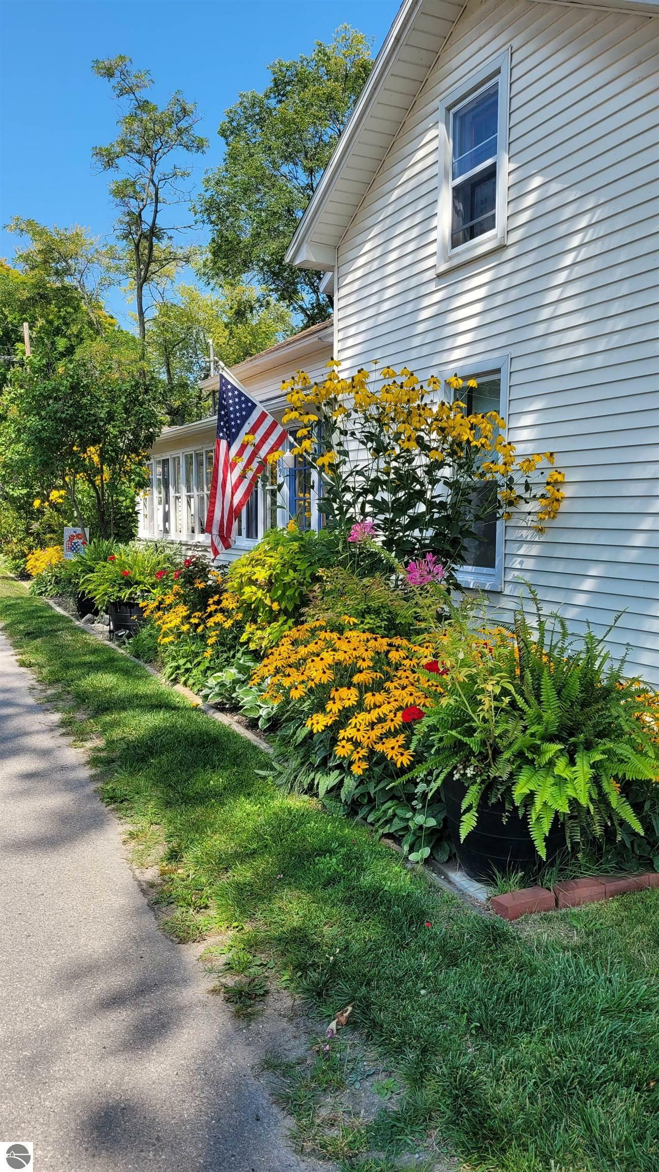 Property Photo:  302 N Rose Street  MI 49670 