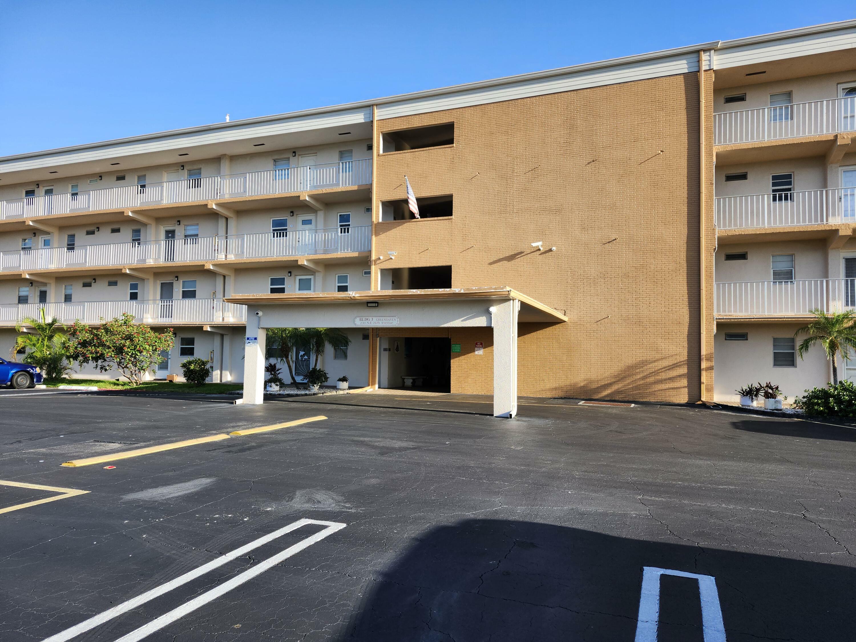Property Photo:  230 NE 26th Avenue 216  FL 33435 