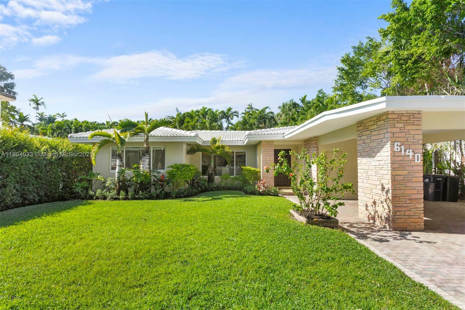 Property Photo: 6140 Pine Tree Dr FL 33140